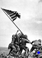Raising the flag at Iwo Jima in WW II